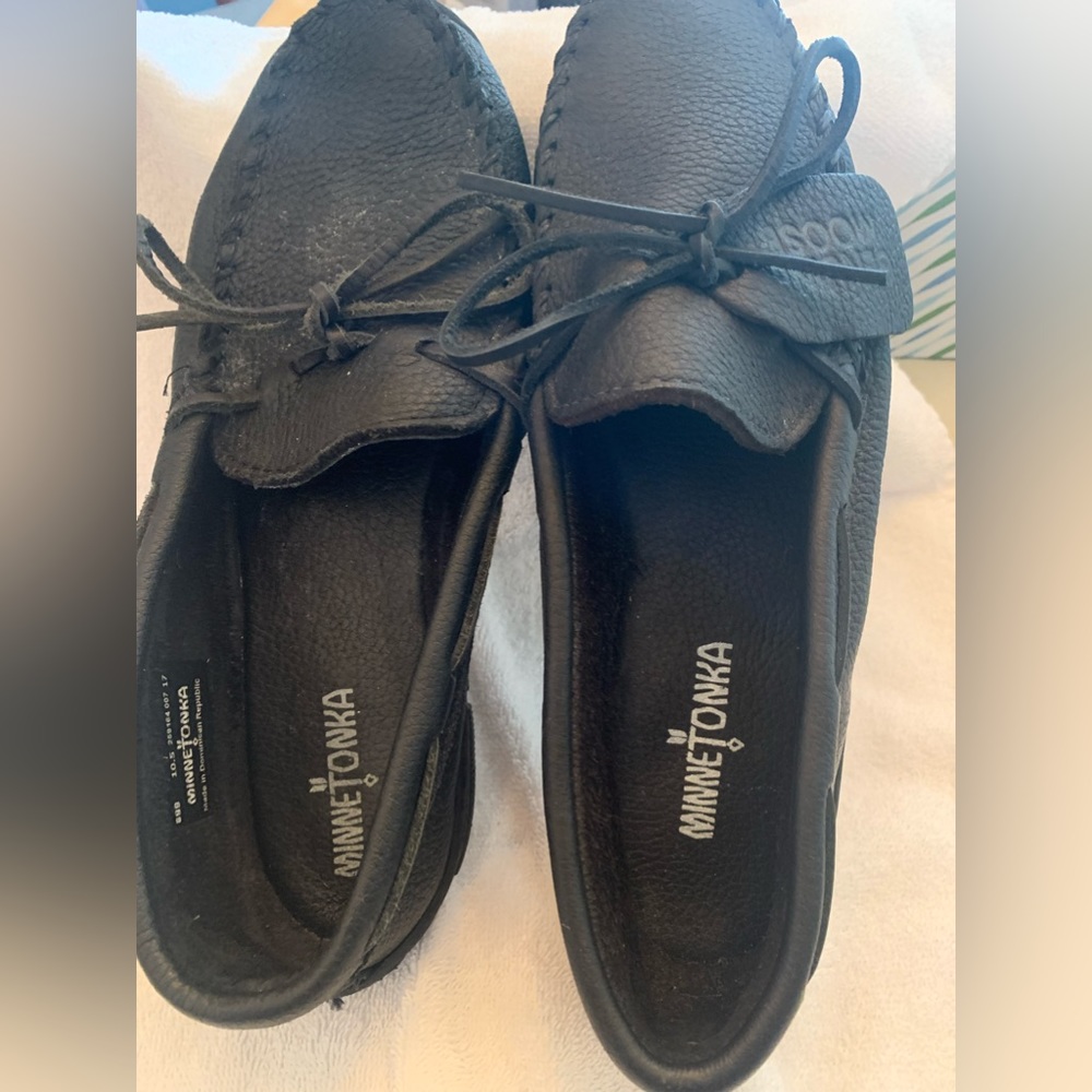 Moose hide Minnetonka Moccasins.  Never wore outside of the house.